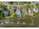 Aerial view of waterfront homes with private docks and boats at 1374 Black River Dr, Mount Pleasant, SC 29466