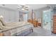 Bedroom with a four-poster bed, dresser, and access to a bathroom at 1374 Black River Dr, Mount Pleasant, SC 29466