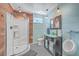 Unique bathroom with a walk-in shower, toilet and urinal at 1374 Black River Dr, Mount Pleasant, SC 29466