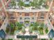 Aerial view of a beautiful courtyard with pool and seating at 609 King St # 740, Charleston, SC 29403
