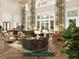Spacious lobby with large windows and seating areas at 609 King St # 740, Charleston, SC 29403
