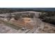 Aerial view of a residential construction site showing land preparation and infrastructure work at 1635 Siloh Dr # 483, Mount Pleasant, SC 29466