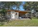 Large storage shed with covered patio area and grill at 3264 Heaton Dr, Ladson, SC 29456