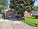 Brick house with a large tree and grassy yard at 3264 Heaton Dr, Ladson, SC 29456