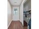 Closet with built-in shelving and a louvered door at 3264 Heaton Dr, Ladson, SC 29456