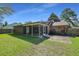 Large backyard with screened porch, patio, and shed at 3264 Heaton Dr, Ladson, SC 29456