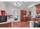 Kitchen with wood cabinets and granite countertops at 3264 Heaton Dr, Ladson, SC 29456