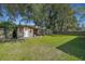 Wooden storage shed with covered patio area at 3264 Heaton Dr, Ladson, SC 29456