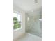 Spacious shower with marble tile and glass enclosure at 72 Drake St # A, Charleston, SC 29403