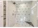 Spa-like shower with marble tile and glass enclosure at 11 George St # Abcd, Charleston, SC 29401