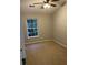 Spacious bedroom with carpeted floor and large window at 9064 Maple Grove Dr, Summerville, SC 29485