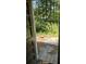 View from doorway to backyard, showing overgrown vegetation at 436 W Butternut Rd, Summerville, SC 29483