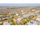 Elevated view of the house and neighborhood, showcasing waterfront proximity at 512 Carolina Blvd, Isle of Palms, SC 29451