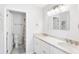 Double vanity bathroom with marble countertops and shower/tub combo at 512 Carolina Blvd, Isle of Palms, SC 29451