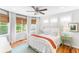Cozy bedroom with queen bed and hardwood floors, featuring natural light at 512 Carolina Blvd, Isle of Palms, SC 29451