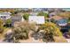 Aerial view of beach neighborhood, showcasing a home with private pool and ocean views at 512 Carolina Blvd, Isle of Palms, SC 29451