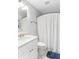 Clean bathroom with white vanity, marble countertop, and shower at 512 Carolina Blvd, Isle of Palms, SC 29451