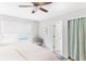 Bedroom with king bed, hardwood floors, and access to bathroom at 512 Carolina Blvd, Isle of Palms, SC 29451