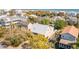 Aerial view of beach neighborhood, showcasing a home with private pool and ocean views at 512 Carolina Blvd, Isle of Palms, SC 29451