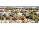 Aerial view of beachfront home with private pool and lush landscaping at 512 Carolina Blvd, Isle of Palms, SC 29451