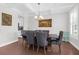 Formal dining room with dark hardwood floors and a large table at 1255 Hammrick Ln, Johns Island, SC 29455