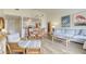 Living room with light blue couch and wicker chairs at 40 Lagoon Villas, Isle of Palms, SC 29451