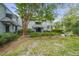 Exterior view of the property entrance with landscaping and a bicycle at 5532 Turtle Cove Ln, Kiawah Island, SC 29455