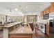 Open kitchen with granite countertops and stainless steel appliances at 5532 Turtle Cove Ln, Kiawah Island, SC 29455