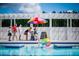 Community pool with ice cream vendor and families enjoying the day at 1089 Keeper Ln, Summerville, SC 29485