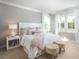 Spacious bedroom with large windows and cozy bedding at 1089 Keeper Ln, Summerville, SC 29485