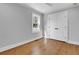 Charming bedroom with hardwood floors, a closet and a window at 4961 Baylor Ave, North Charleston, SC 29405