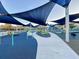 Modern playground with shade canopies and blue flooring at 4961 Baylor Ave, North Charleston, SC 29405