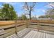 Wooden deck overlooking backyard with wooden fence at 4961 Baylor Ave, North Charleston, SC 29405