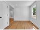 Simple bedroom with hardwood floors and white walls at 4961 Baylor Ave, North Charleston, SC 29405