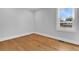 Bright bedroom with hardwood floors and a large window at 4961 Baylor Ave, North Charleston, SC 29405