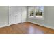 Spacious bedroom featuring hardwood floors and a double door closet at 4961 Baylor Ave, North Charleston, SC 29405