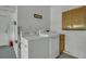 Laundry room with washer, dryer and wood cabinets at 215 Angora Way, Summerville, SC 29485