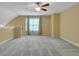 Large bedroom with window and ceiling fan at 215 Angora Way, Summerville, SC 29485