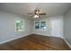 Bright living room featuring hardwood floors and neutral-colored walls at 4418 Cindy Ln, North Charleston, SC 29418