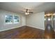 Spacious living room with hardwood floors and access to hallway at 4418 Cindy Ln, North Charleston, SC 29418