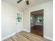 Dining room with vinyl flooring and access to other rooms at 4418 Cindy Ln, North Charleston, SC 29418