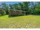 Brick ranch house with a well-maintained lawn at 4418 Cindy Ln, North Charleston, SC 29418
