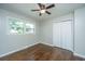 Bedroom with hardwood floors, neutral walls, and double door closet at 4418 Cindy Ln, North Charleston, SC 29418