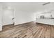 Spacious living area with hardwood floors and kitchen at 2312 Meridian Rd, North Charleston, SC 29405