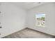 Cozy bedroom featuring a window and carpet at 2312 Meridian Rd, North Charleston, SC 29405