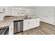Modern kitchen with island, stainless steel appliances, and granite countertops at 2312 Meridian Rd, North Charleston, SC 29405
