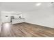 Open living area with hardwood floors and kitchen at 2312 Meridian Rd, North Charleston, SC 29405
