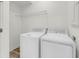 Laundry room with washer, dryer, and shelving at 2312 Meridian Rd, North Charleston, SC 29405
