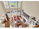 High-ceiling living room with hardwood floors, fireplace, and built-in shelves at 3350 Seabrook Island Rd, Seabrook Island, SC 29455