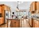 Island kitchen boasts granite countertops, stainless steel appliances, and hardwood floors at 3350 Seabrook Island Rd, Seabrook Island, SC 29455